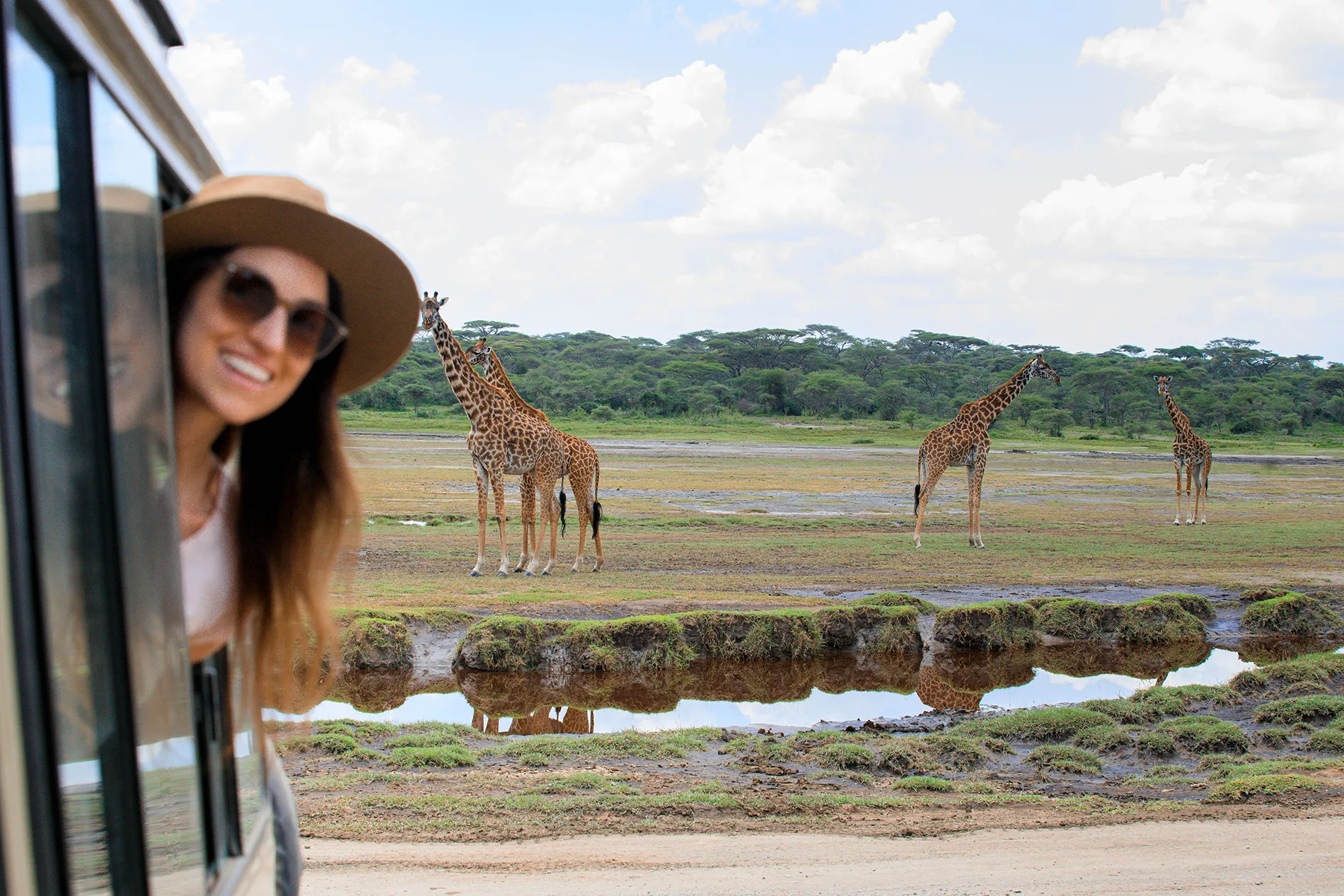 Travellers on a shared game drive